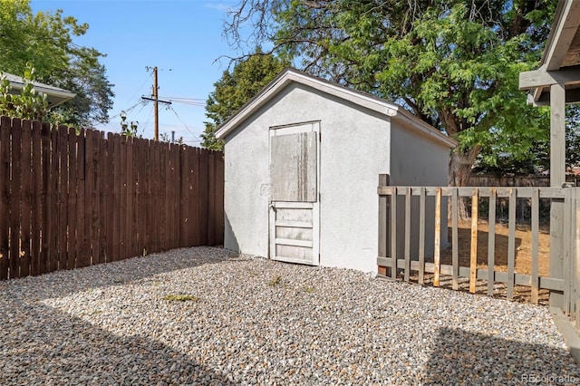 view of shed featuring a fenced backyard