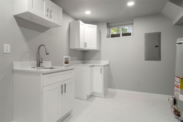 clothes washing area featuring hookup for a washing machine, recessed lighting, a sink, baseboards, and electric panel