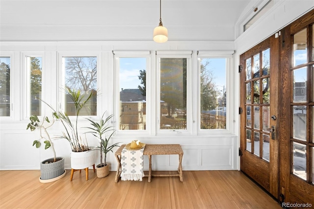 sunroom featuring french doors