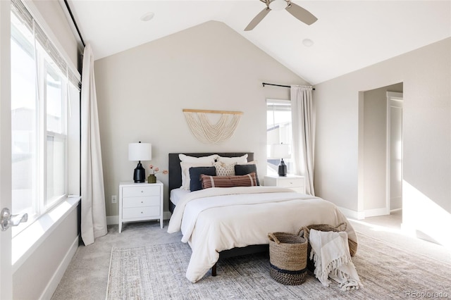 carpeted bedroom with lofted ceiling and ceiling fan