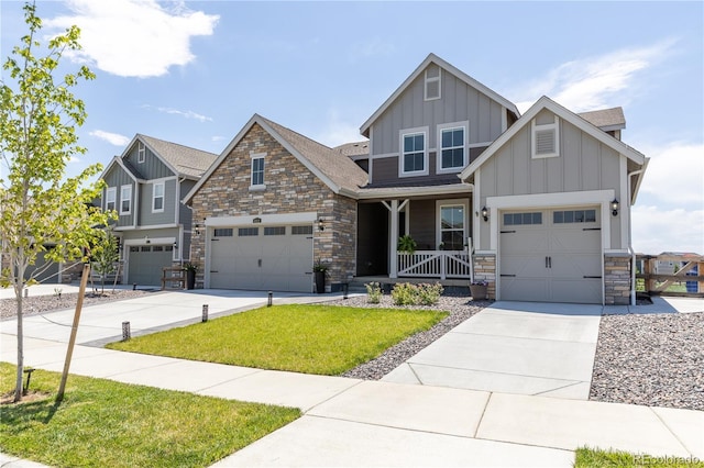 4918 Preserve Pl, Firestone, CO 80504 - craftsman inspired home with board and batten siding, stone siding, and concrete driveway