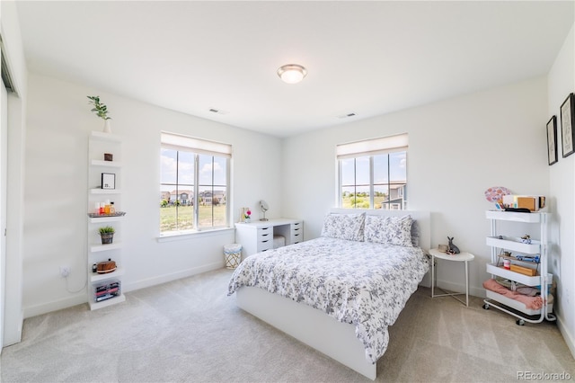 4918 Preserve Pl, Firestone, CO 80504 - bedroom featuring light carpet and baseboards