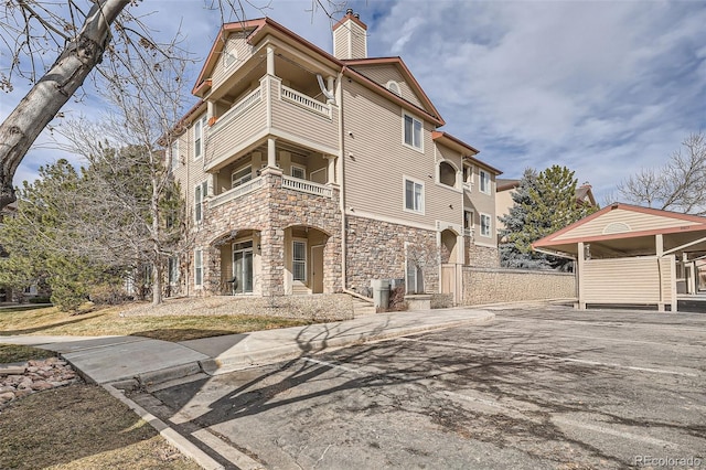 view of property with a carport