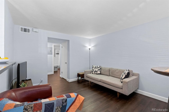 living room with dark wood-type flooring