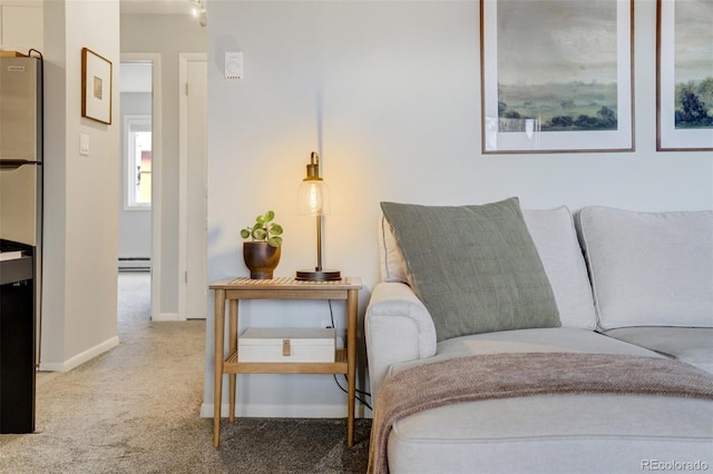 401 Forest Edge Rd Unit B1, Woodland Park, CO 80863 - sitting room featuring carpet, baseboards, and baseboard heating