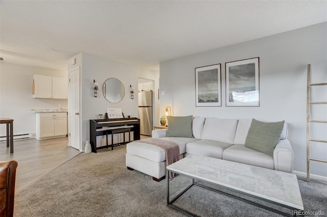 401 Forest Edge Rd Unit B1, Woodland Park, CO 80863 - living room with baseboards and light wood finished floors