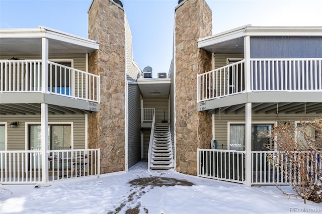 view of snow covered house