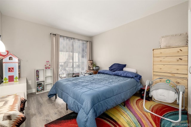 bedroom featuring wood-type flooring