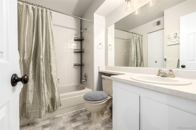 full bathroom featuring vanity, toilet, and shower / tub combo with curtain