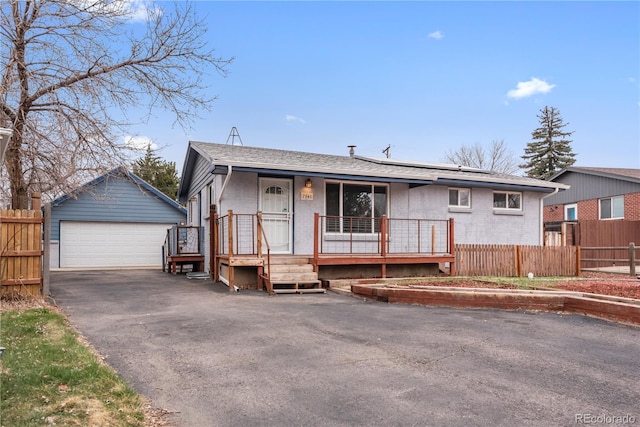 view of front of house with an outbuilding and a garage