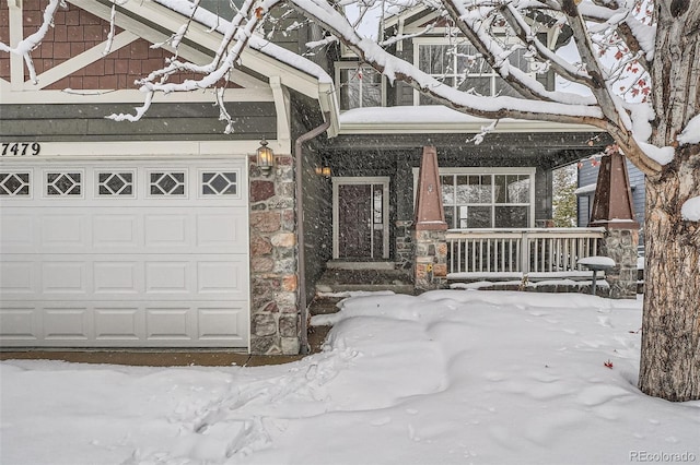 exterior space featuring a porch and a garage