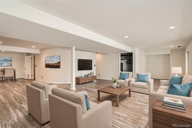 living room with hardwood / wood-style flooring