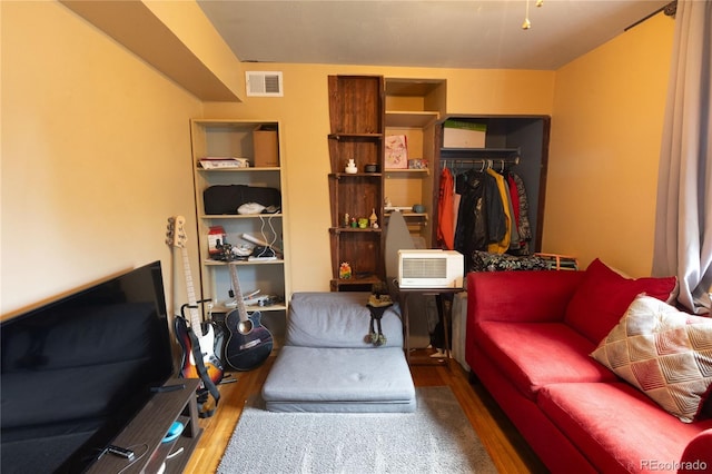 living room with hardwood / wood-style floors