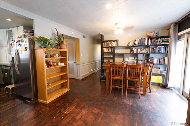 dining room with hardwood / wood-style flooring