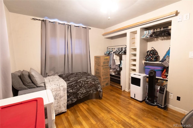 bedroom with wood-type flooring