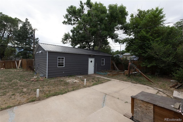 rear view of house with a patio