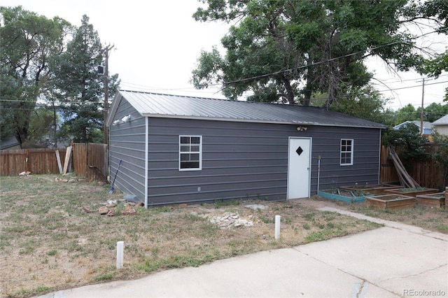 view of front of property with an outbuilding