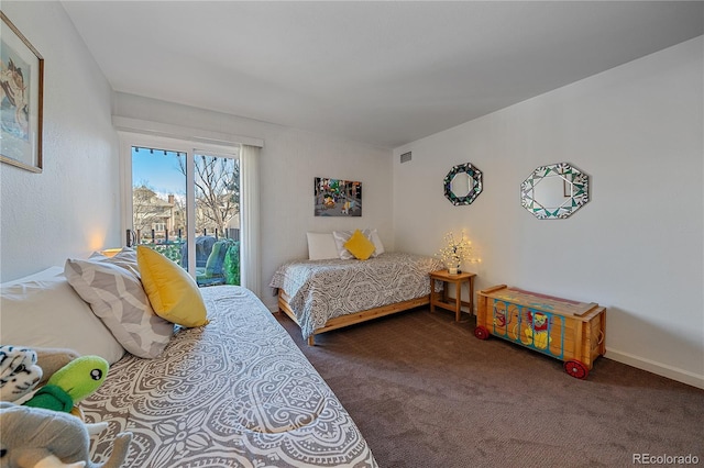 carpeted bedroom with access to exterior, visible vents, and baseboards