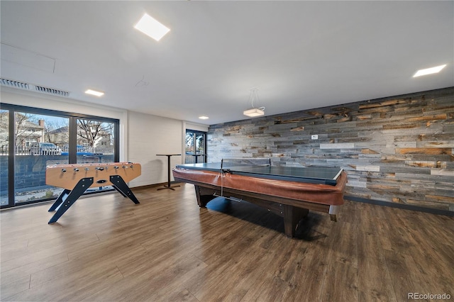 rec room featuring visible vents and wood finished floors