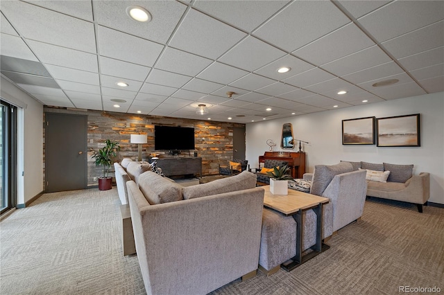 living room with recessed lighting, a fireplace, a paneled ceiling, and light colored carpet