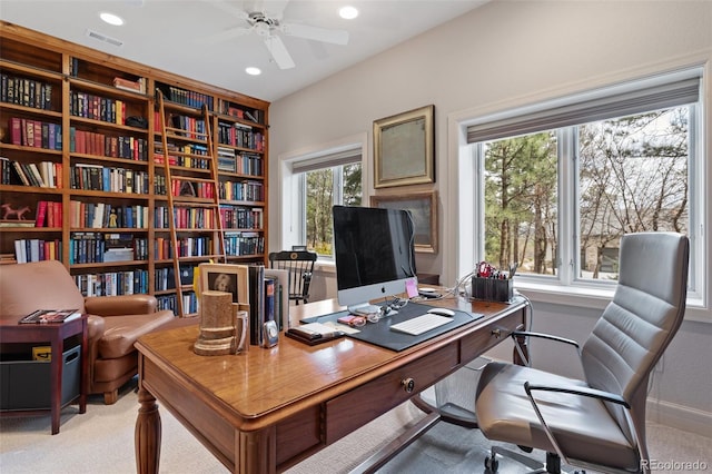office area with ceiling fan, light colored carpet, recessed lighting, baseboards, and visible vents