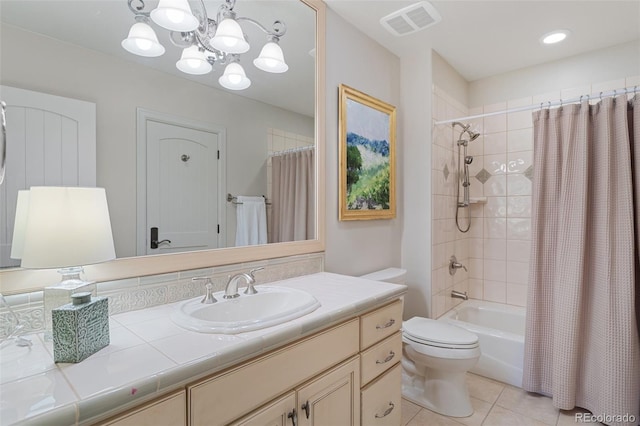 full bathroom with shower / bath combination with curtain, visible vents, tile patterned flooring, vanity, and an inviting chandelier