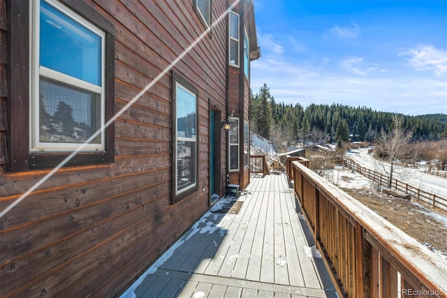 view of snow covered deck