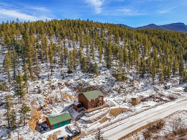2476 S Beaver Creek Rd, Black Hawk, CO 80422 - snowy aerial view featuring a forest view and a mountain view