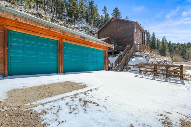 2476 S Beaver Creek Rd, Black Hawk, CO 80422 - view of snow covered garage