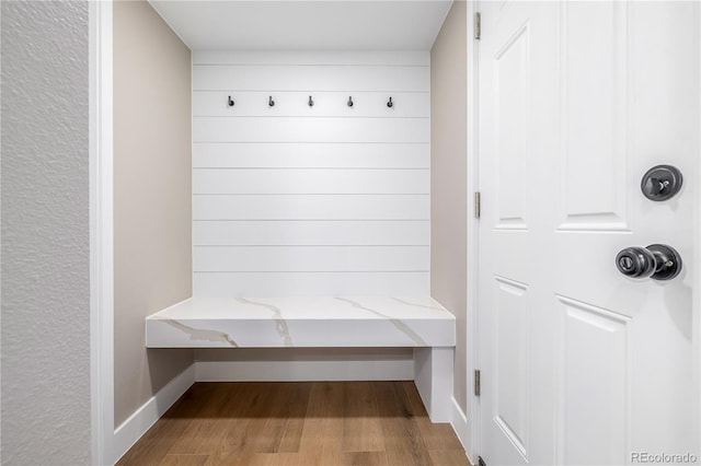 mudroom with light hardwood / wood-style floors