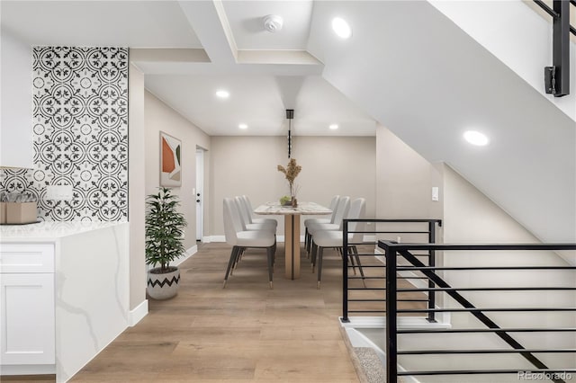 dining space featuring light hardwood / wood-style floors