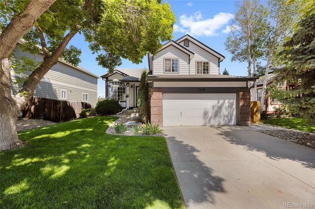 7345 W 97th Pl, Broomfield, CO 80021 - traditional-style home featuring brick siding, a garage, and driveway