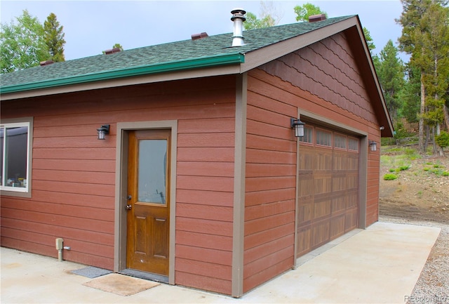 view of outbuilding featuring a garage