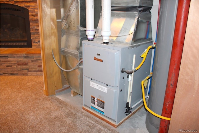 utility room with heating unit