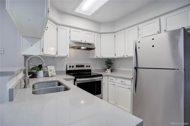 kitchen featuring white cabinets, sink, and stainless steel appliances