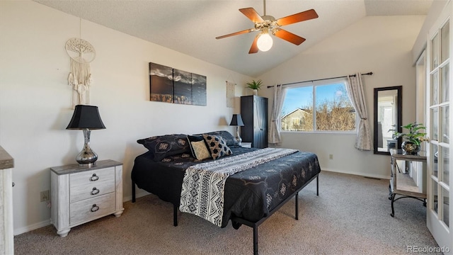 bedroom with carpet floors, a ceiling fan, baseboards, and vaulted ceiling