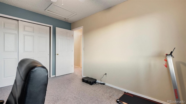 home office with baseboards, carpet floors, and a textured ceiling