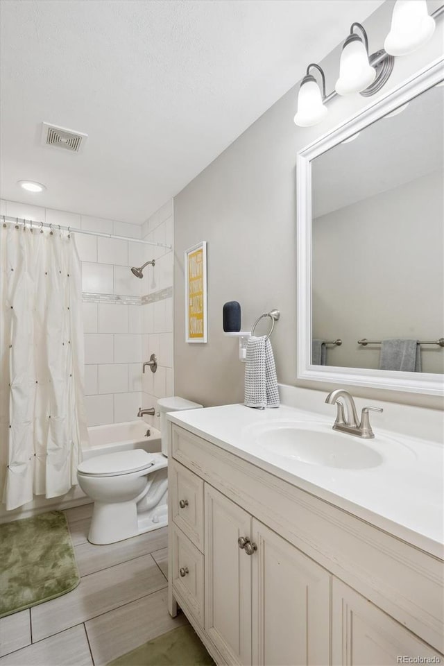 full bathroom with toilet, visible vents, shower / bath combination with curtain, and vanity