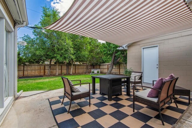 view of patio with a fenced backyard