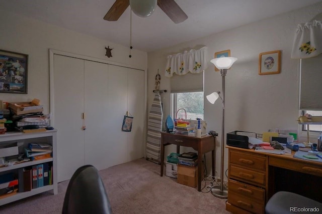 office space featuring carpet floors and ceiling fan