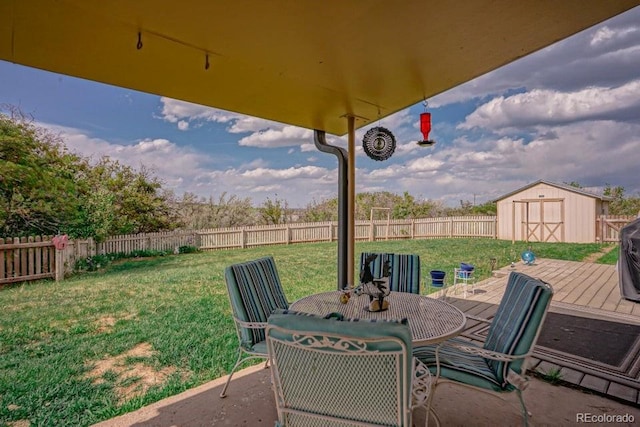 view of patio / terrace with a storage shed