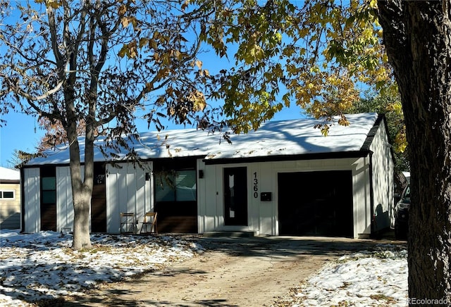 ranch-style home with a garage