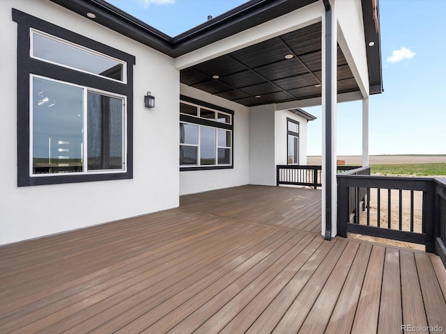62101 E 32nd Ct, Strasburg, CO 80136 - view of wooden terrace