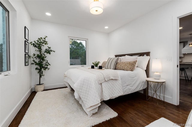 bedroom featuring dark wood-type flooring