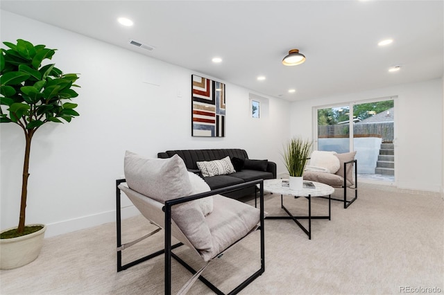 living room with light colored carpet