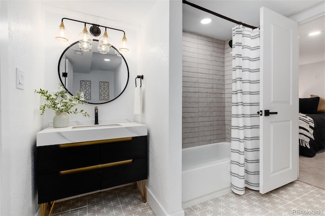 bathroom featuring vanity and shower / bath combo with shower curtain