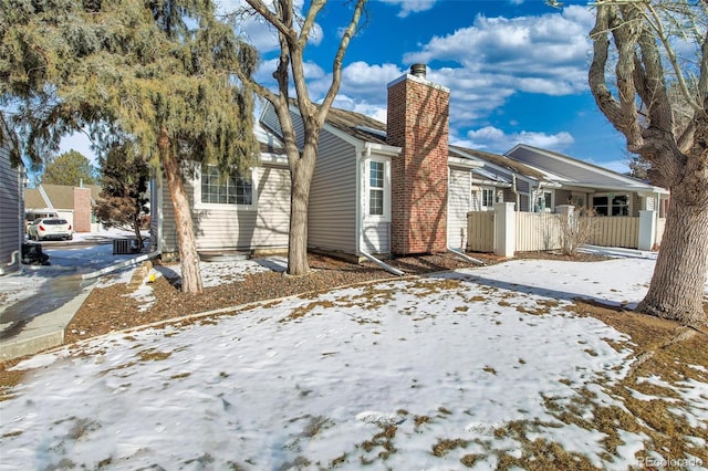 view of snow covered property