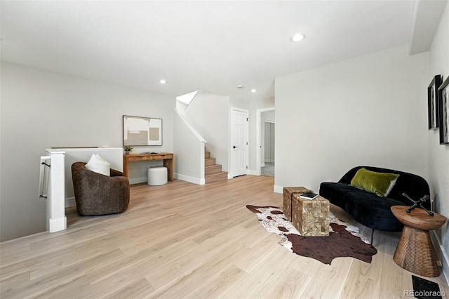 11635 W Security Ave, Lakewood, CO 80401 - sitting room featuring light wood-style floors, stairs, and recessed lighting