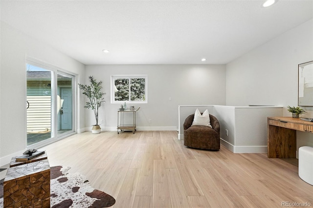 11635 W Security Ave, Lakewood, CO 80401 - living area with light wood-style flooring and recessed lighting