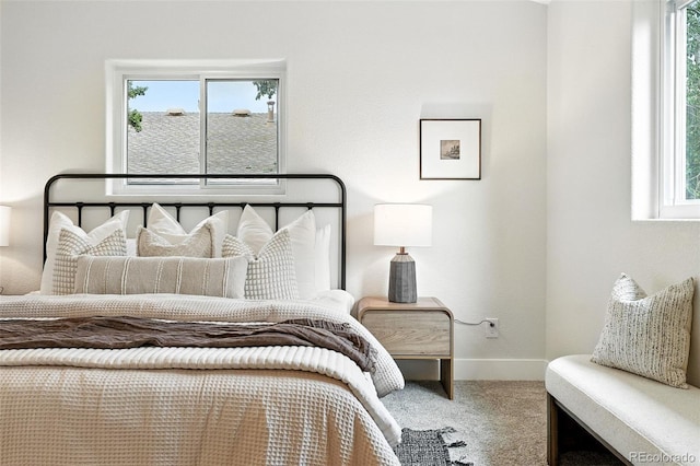 11635 W Security Ave, Lakewood, CO 80401 - carpeted bedroom featuring multiple windows
